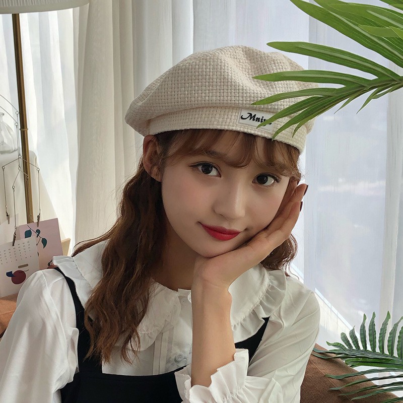 Beret hat with checkered and vintage style letters for women