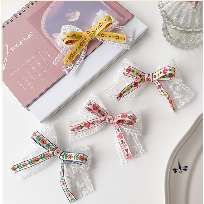 Kẹp nơ ren trắng họa tiết cổ điển KEP06