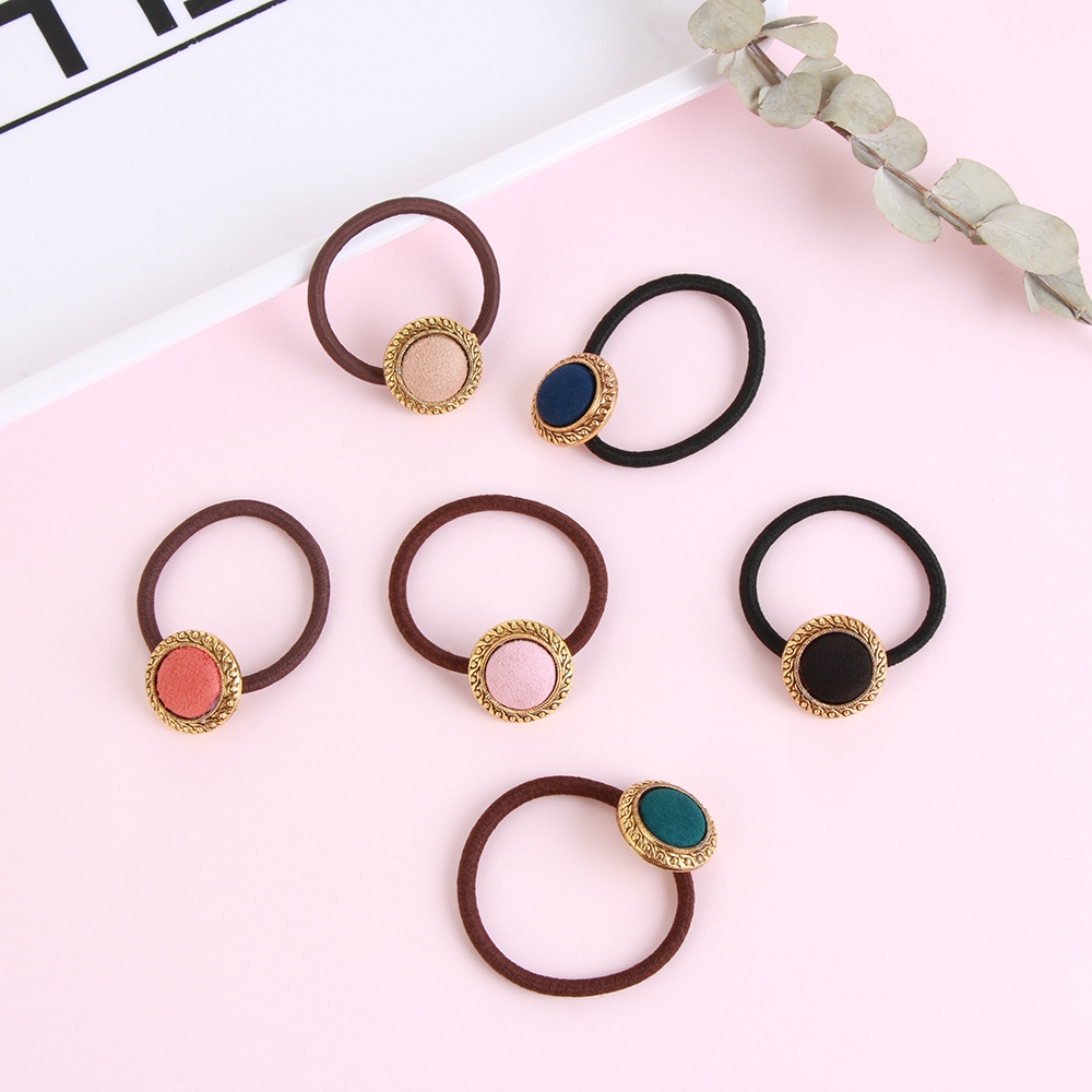 Cài tóc đính nút thời trang nữ tính