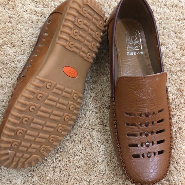 Giày nam đục lỗ