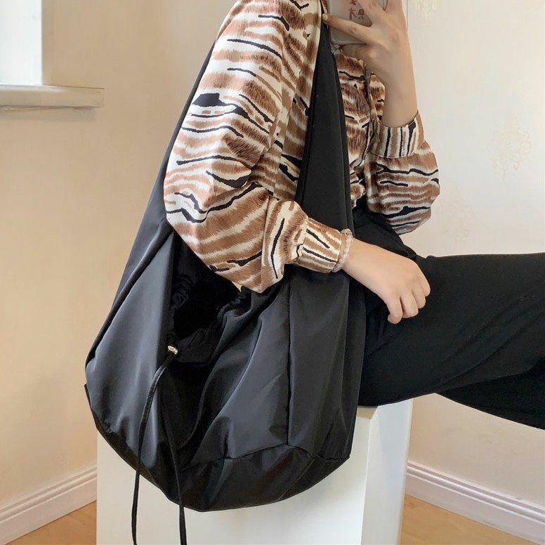 Túi đeo chéo tay nải cỡ lớn dây rút vải dù chống nước