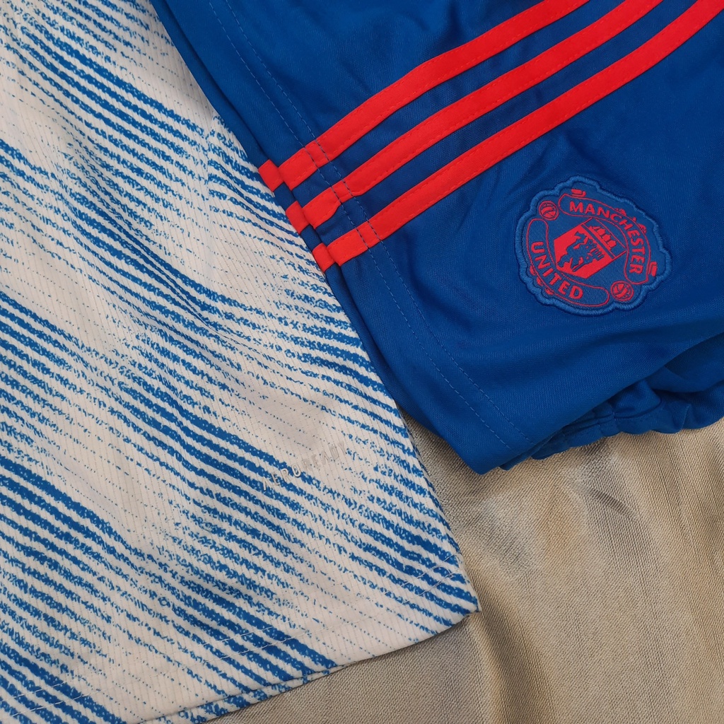 Bộ đá banh MU xanh sân khách hàng thái