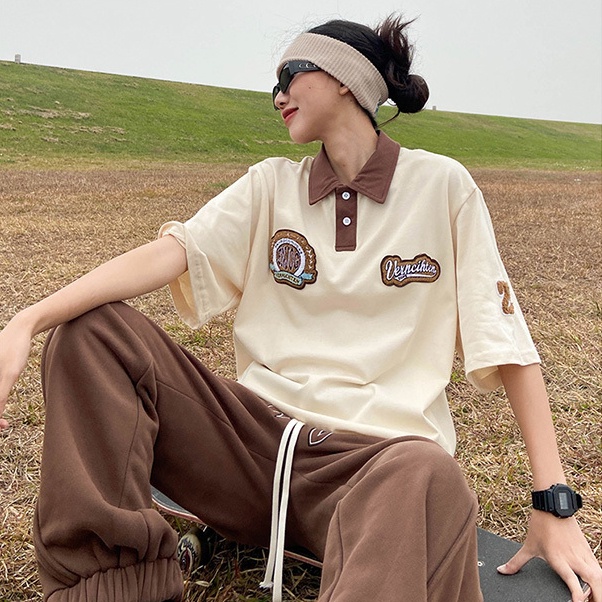 Áo polo Ngắn Tay Dáng Rộng Cổ Đứng Thêu Họa Tiết Đơn Giản Theo Phong Cách Retro Dành Cho Nữ