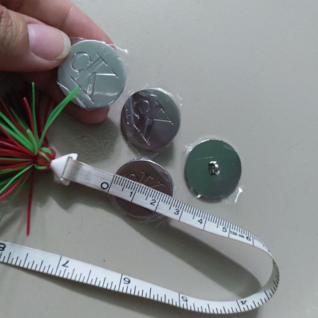 5cái Nút hàng hiệu CK 2.5cm màu bạc,kim loại