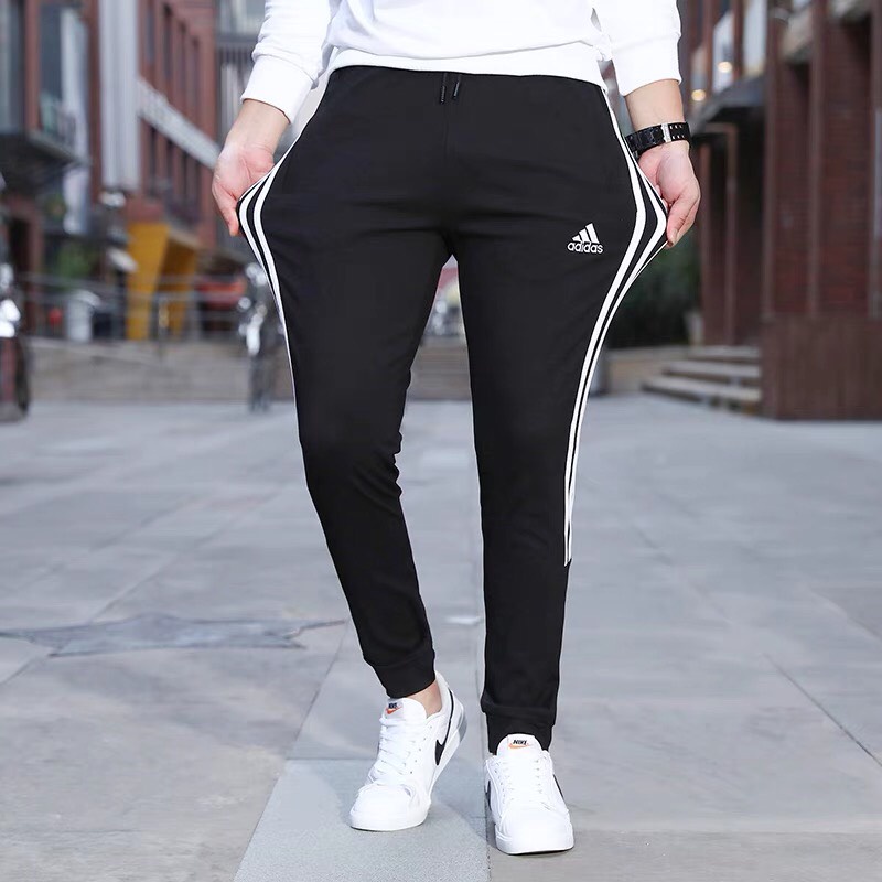 Quần jogger thể thao nam nữ ống bó thu đông hot 2021 chất UMI co dãn