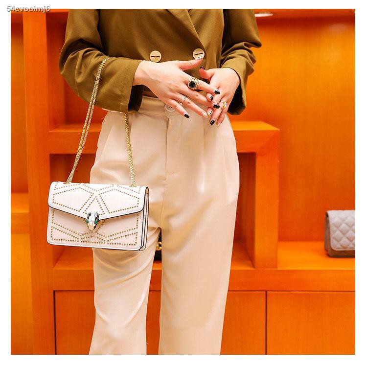 Hồng Kông mua túi đeo đầu rắn ck nhỏ chính hãng túi nữ 2021 xu hướng mới Túi đeo chéo thời trang lưới người nổi tiếng