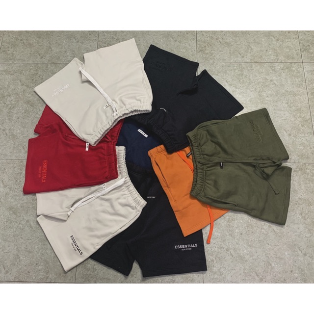 Quần short ngắn đầy đù tem mạc và túi zip