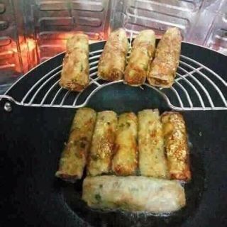 Vỉ gác chảo