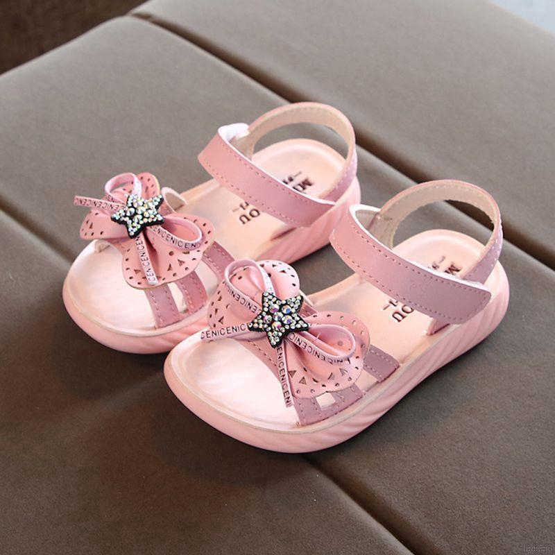 Giày sandal mềm đính nơ xinh xắn cho bé gái