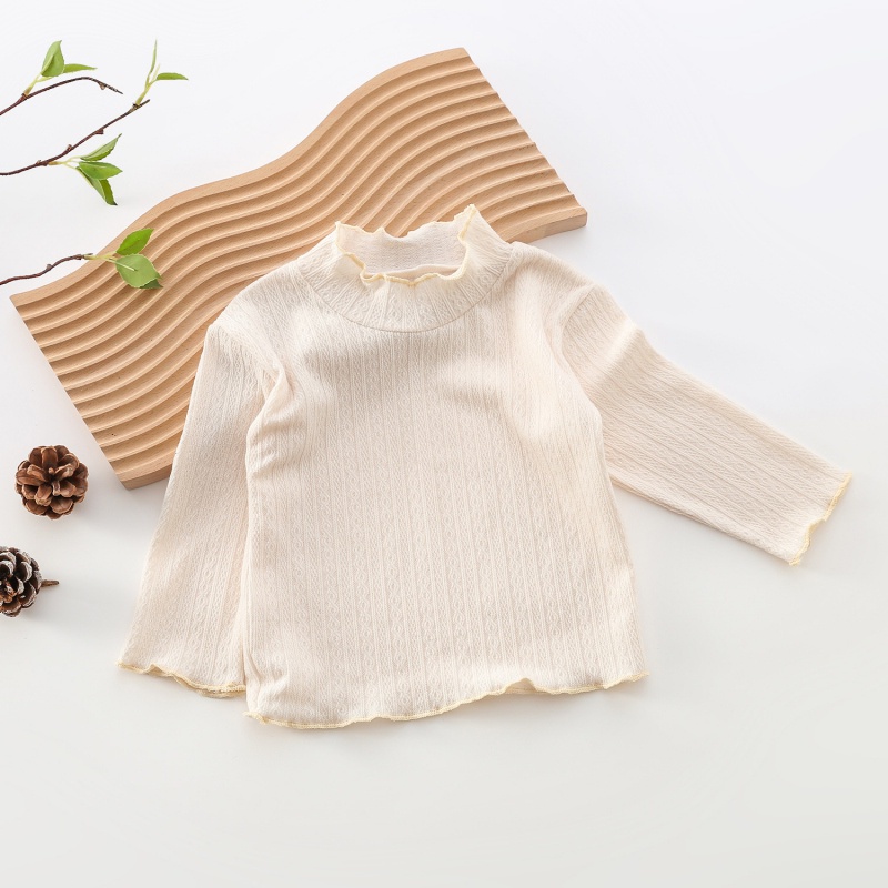 Áo kiểu tay dài cổ lọ chất liệu cotton cho bé gái