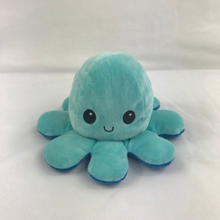 The stuffed octopus toy changes two-faced expressions