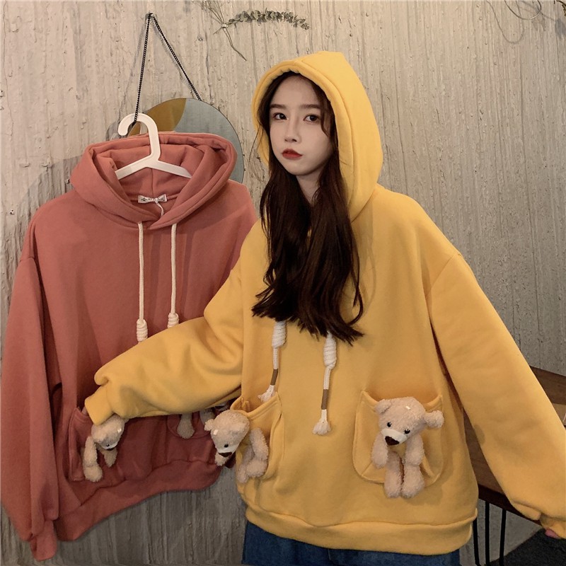 Áo hoodie nữ tay dài có túi áo nhỏ mini 2 bên gắn gấu bông ulzzang ( 2 màu )