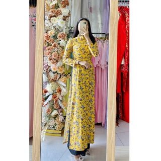 Áo dài in hoa vàng xinh xắn