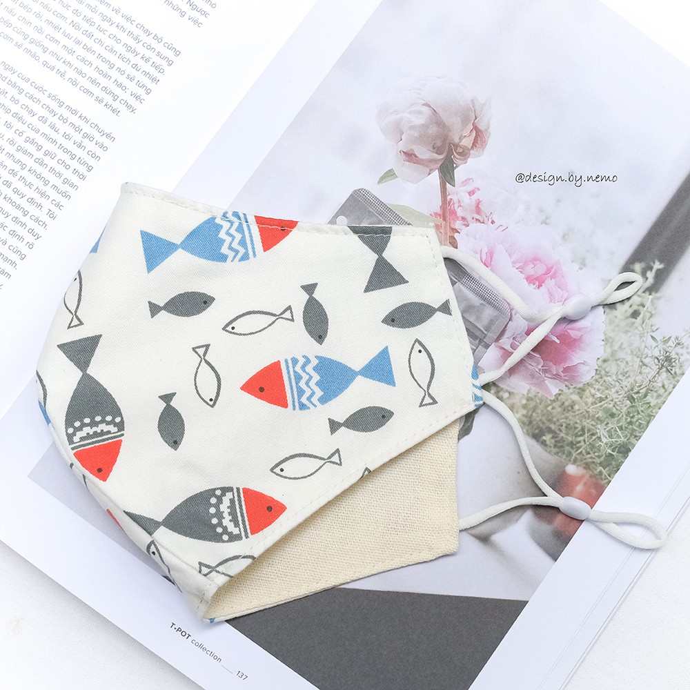 Khẩu Trang Vải Nemo Handmade Họa tiết Cá nền trắng nổi bật, có nút tăng giảm dây tiện lợi - KTCaNenTrang | BigBuy360 - bigbuy360.vn