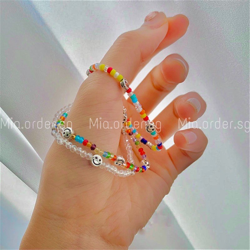 Vòng tay chuỗi hạt pha lê hoặc hạt nhựa HANDMADE nhiều màu sắc có charm mặt cười mạ bạc, mia.order