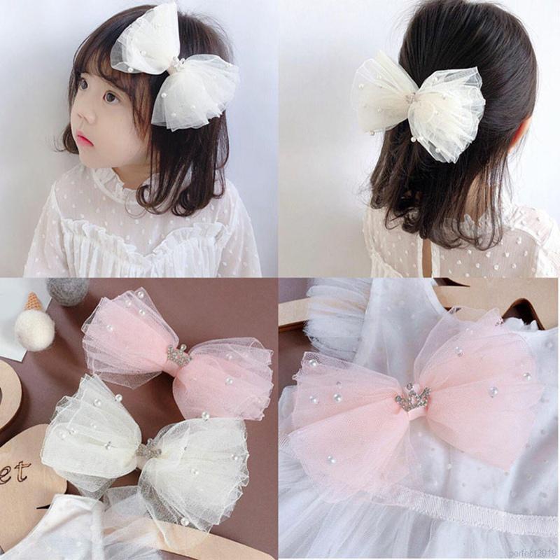 Kẹp nơ ren phối vương miện xinh xắn cho bé gái