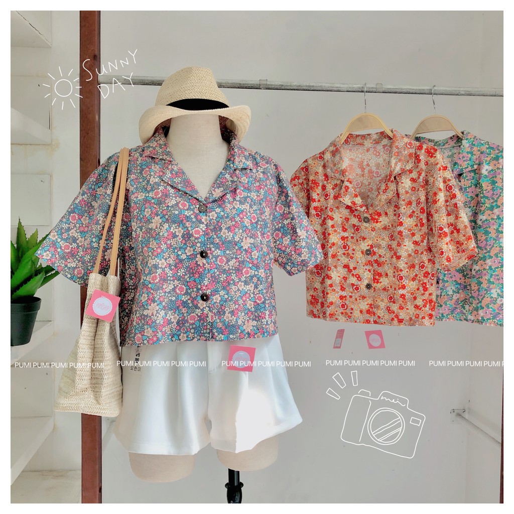 Áo SM hoa nút gỗ freesize Pumi