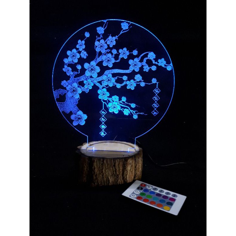 Đèn led cây Mai đế gỗ vỏ tròn.