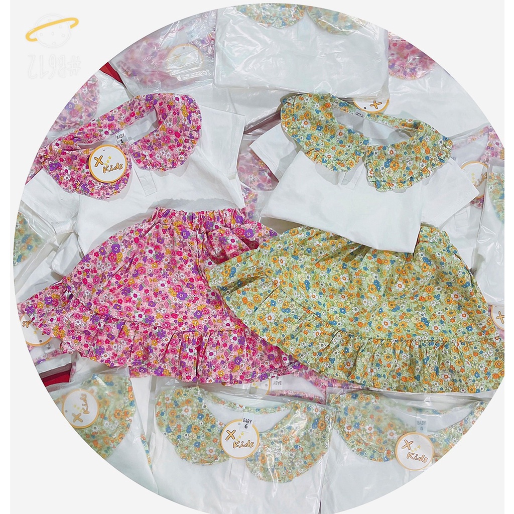 Bộ bé gái trắng cổ sen tròn hoa và chân váy đuôi cá hoa nhí liền quần XHN881