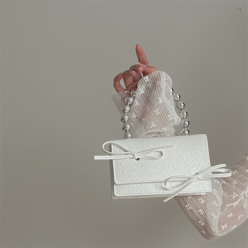 Túi đeo chéo vai IELGY đính đá họa tiết nơ và ngọc trai giả phối dây xích cao cấp cho nữ