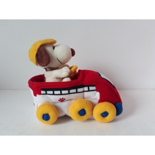 Gấu bông Snoopy chạy xe