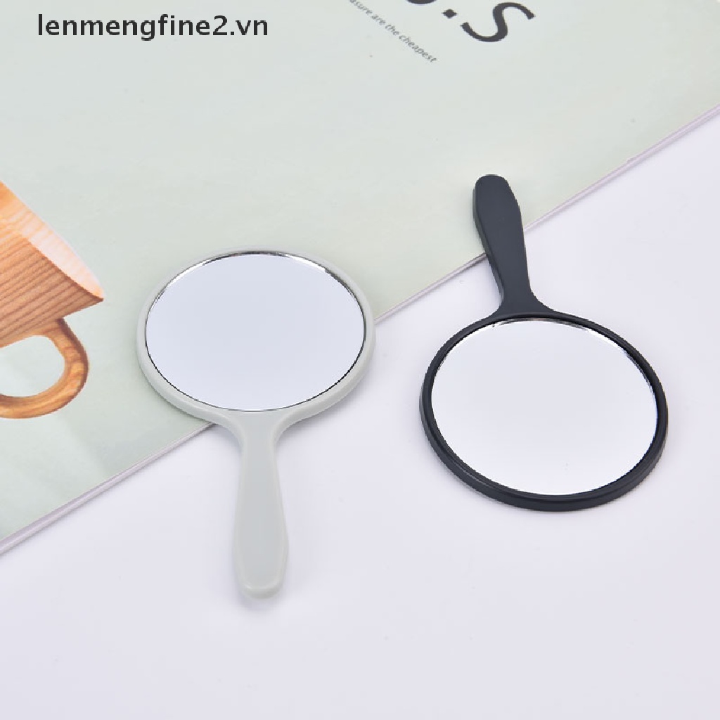 Gương trang điểm cầm tay hình tròn có tay cầm