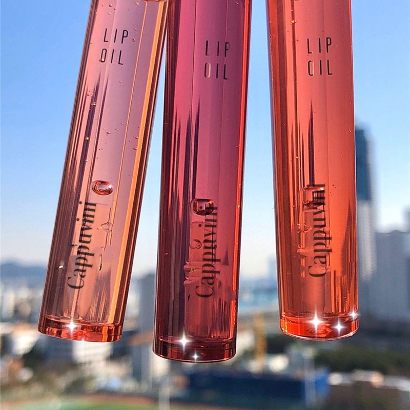 Dầu dưỡng môi dạng lỏng chiết xuất trái cây tự nhiên trong suốt giúp môi căng mọng | BigBuy360 - bigbuy360.vn