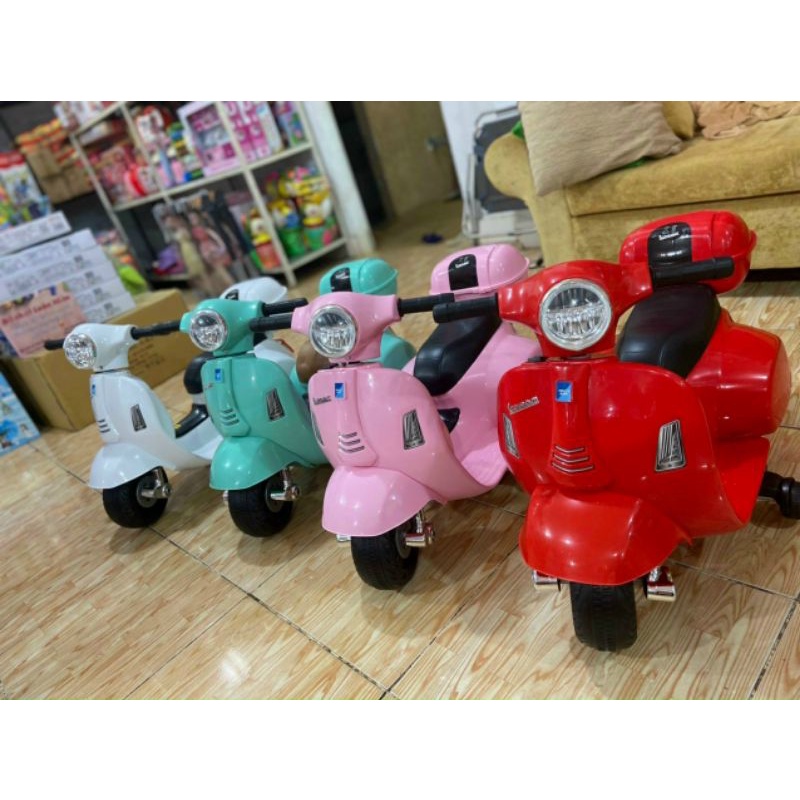 Xe máy vespa cho bé Xe máy điện trẻ em sử dụng chân ga