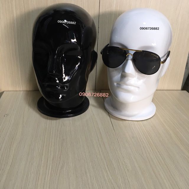 Đầu manocanh đeo kiếng, đội nón