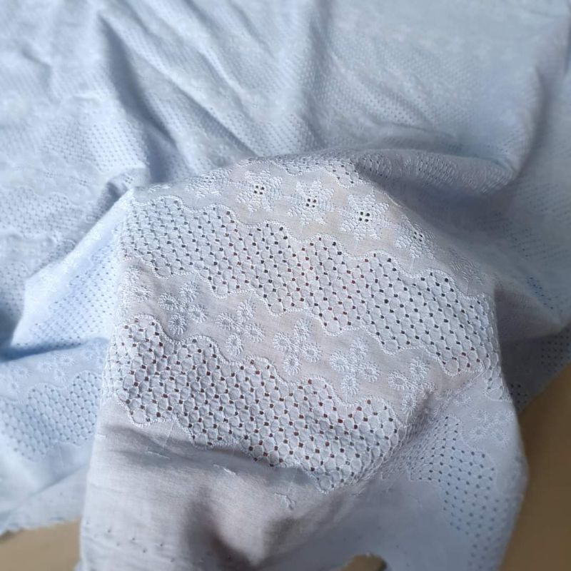 Vải thô boi thêu đục lỗ xanh