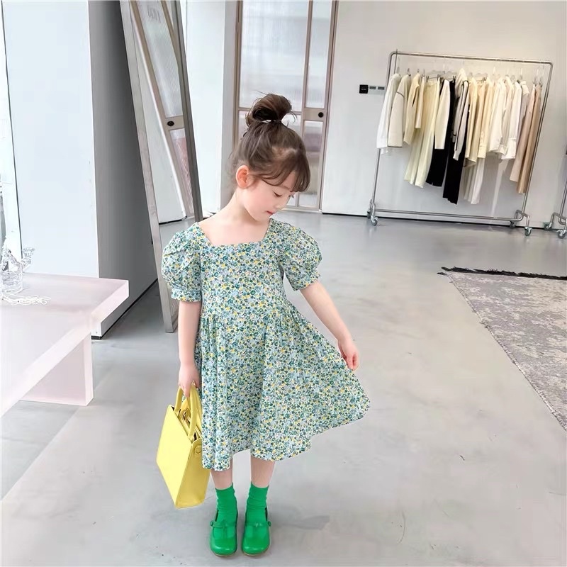 Đầm Melisa hoa nhí nơ vàng cho bé gái siêu xinh