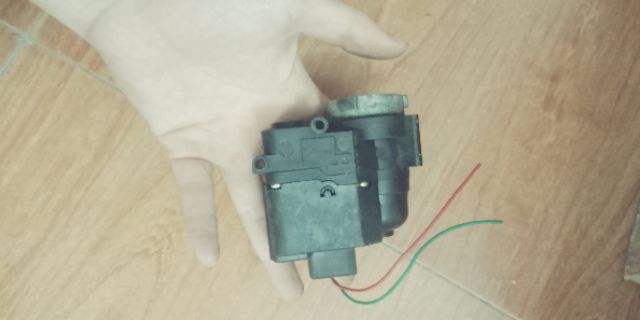 Motor gập gương Kia Caren