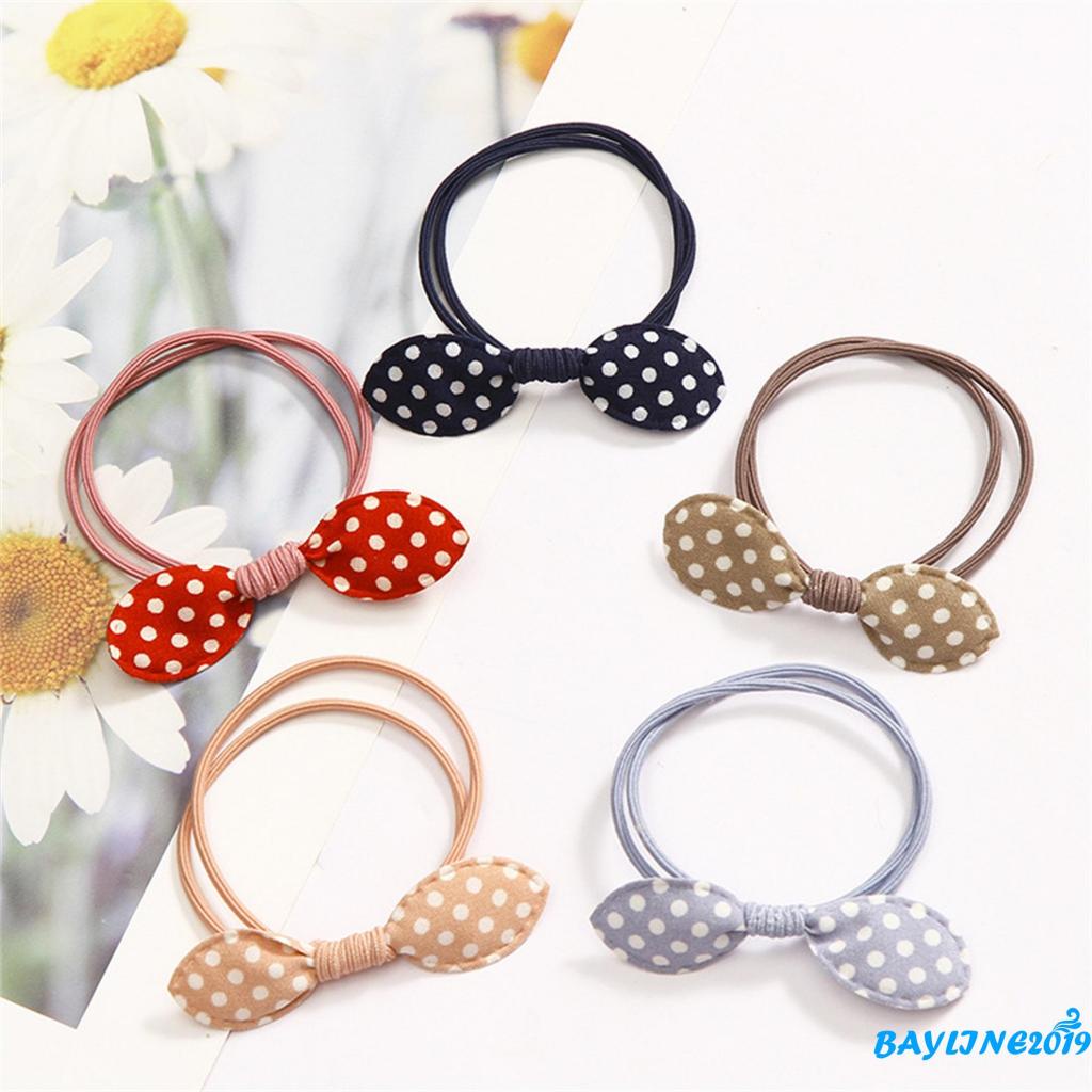 Dây buộc tóc đính nơ họa tiết chấm bi dễ thương cho bé gái