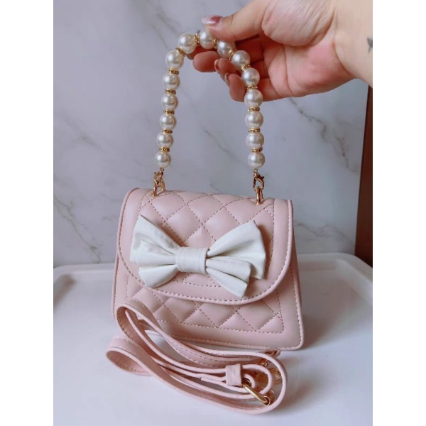 Túi xách đeo chéo mini phối dây ngọc đính nơ dễ thương hai size to và nhỏ có ảnh thật