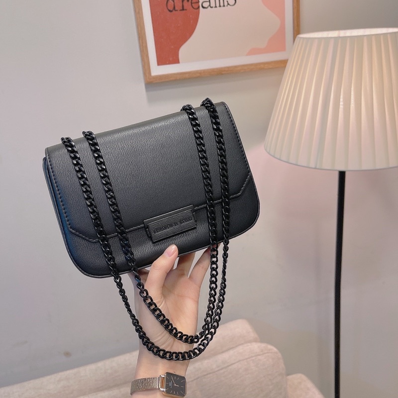 Túi nắp bấm full tag đen