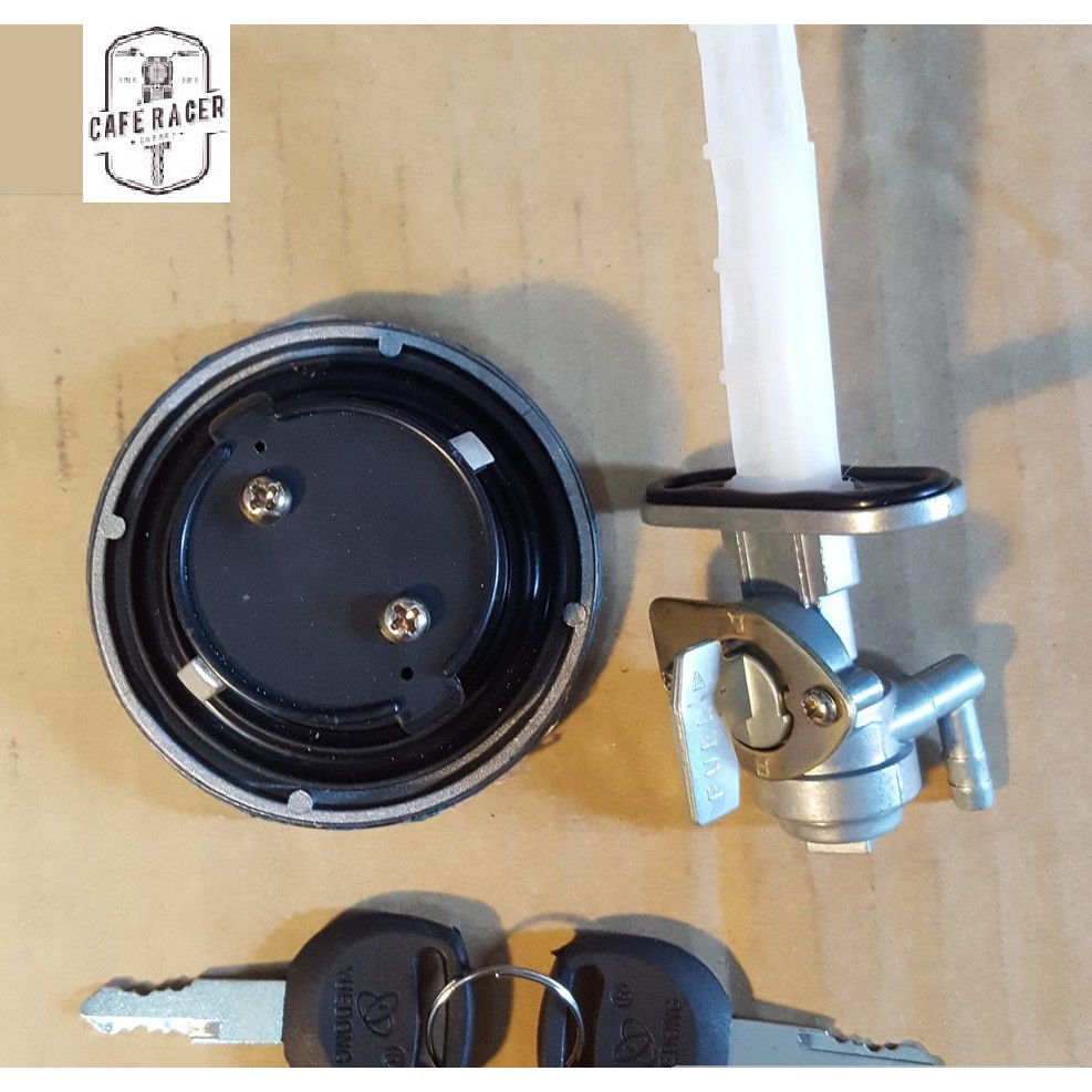 Bộ nắp khóa bình xăng xe máy Su GN, bình Triump mộc