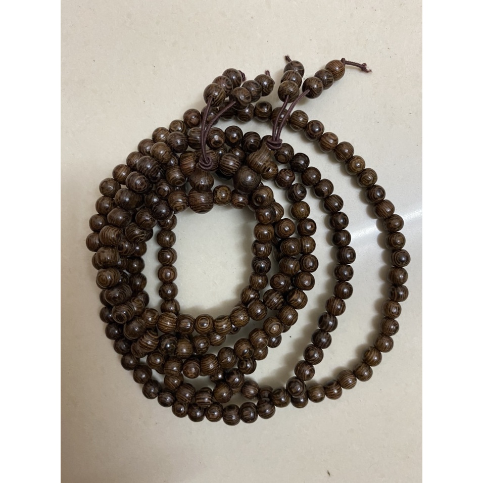 Tràng hạt 108 cỡ hạt 6mm gỗ vân mun đuôi công,vòng mân tự nhiên,vòng phong thủy đeo tay hay đeo cổ đều được
