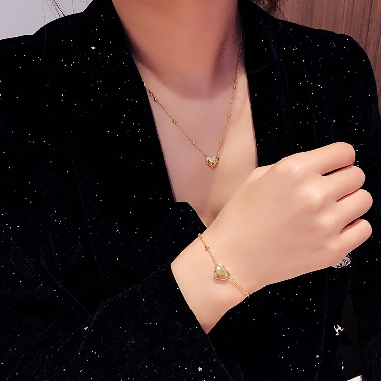 Lắc tay titan nữ không gỉ mặt trái tim xinh xắn mạ vàng 18k thiết kế trẻ trung phong cách hàn quốc