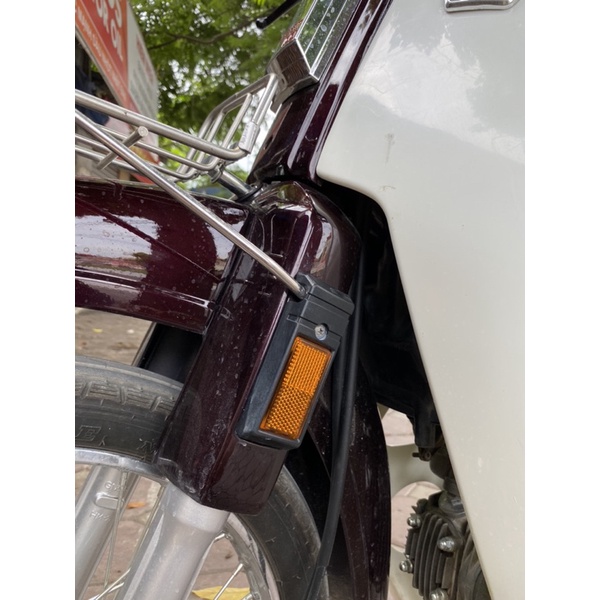 Mắt mèo xe Dream ốp phản quang