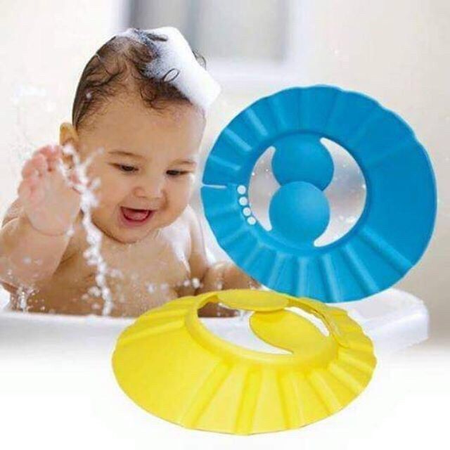 Mũ gội đầu chắn nước cho bé ( có cúc bấm chỉnh)