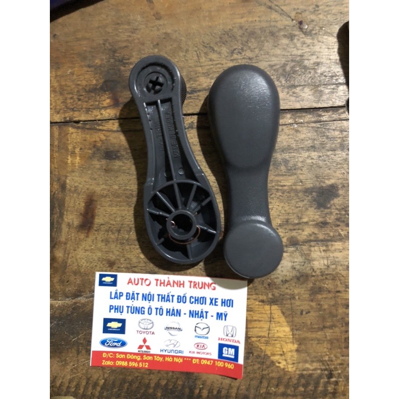 Tay quay kính matiz spark