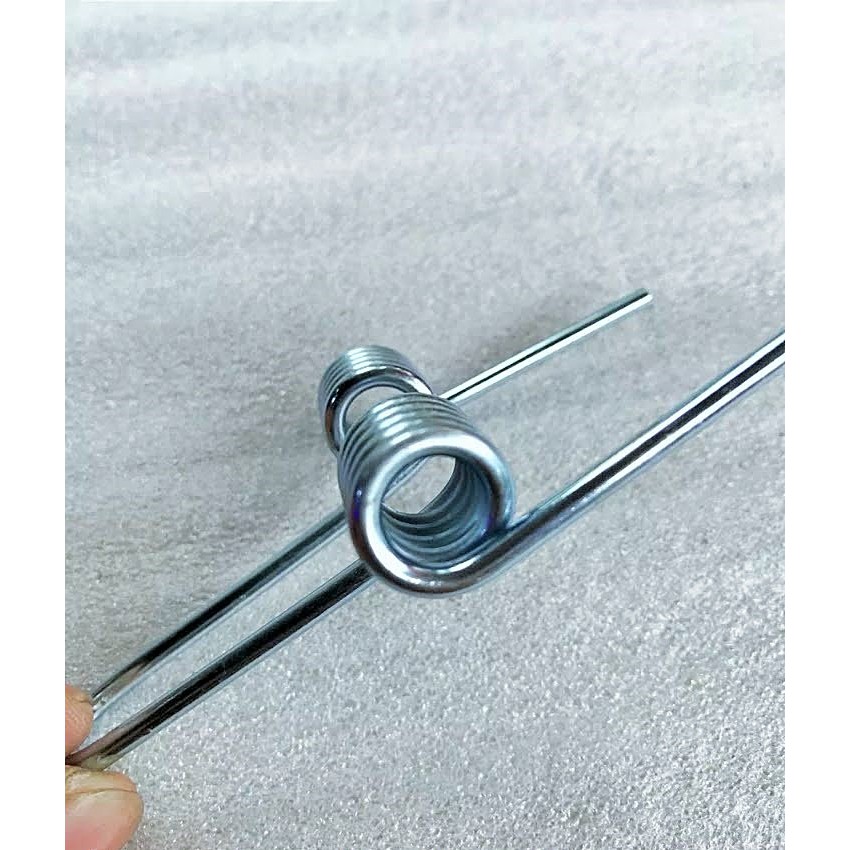 LÒ XO BẬT YÊN XE MÁY