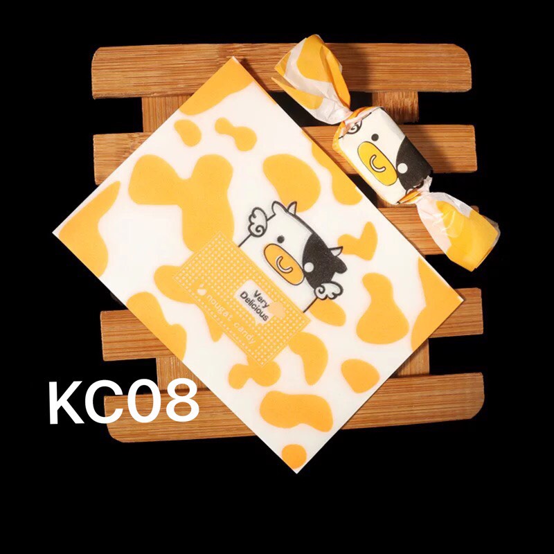 Giấy gói kẹo socola, nougat Bò sữa Cam KC08 - 500c