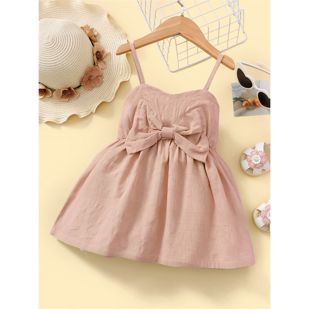 Đầm MIKRDOO hai dây đính nơ màu sắc macaron thời trang đi biển mùa hè dành cho bé gái 1-6 tuổi