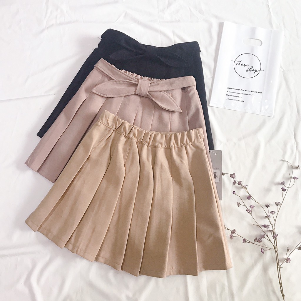 Váy xếp li nơ Lovi