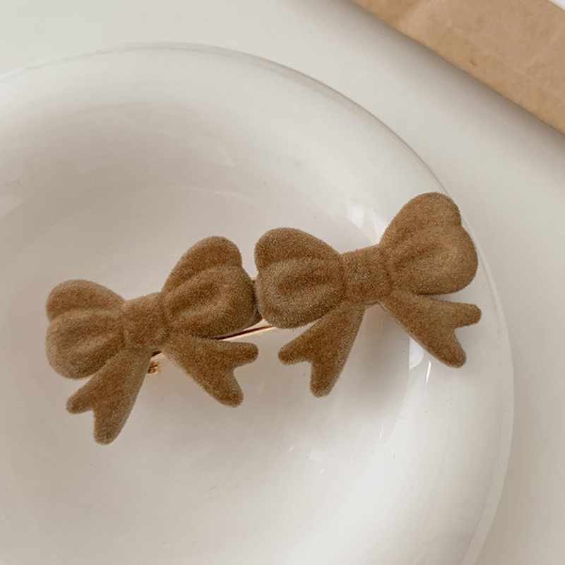 Kẹp tóc hình nơ xinh xắn cho nữ