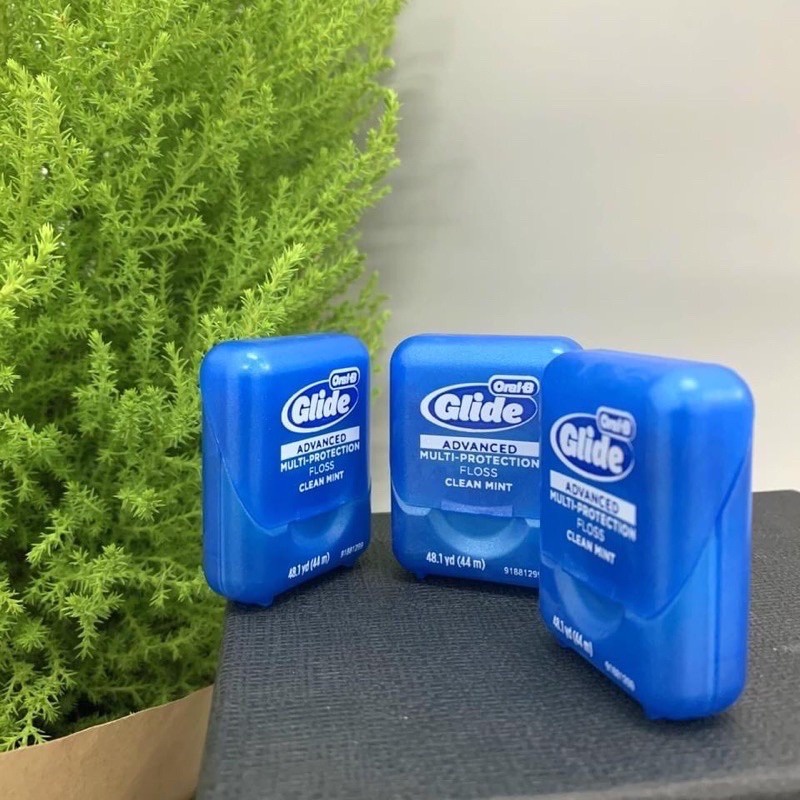 Chỉ nha khoa Oral B Glide Advanced Multi Protection Floss Clean giúp làm sạch các mảng bám ở kẽ răng - EDS Hàng Mỹ