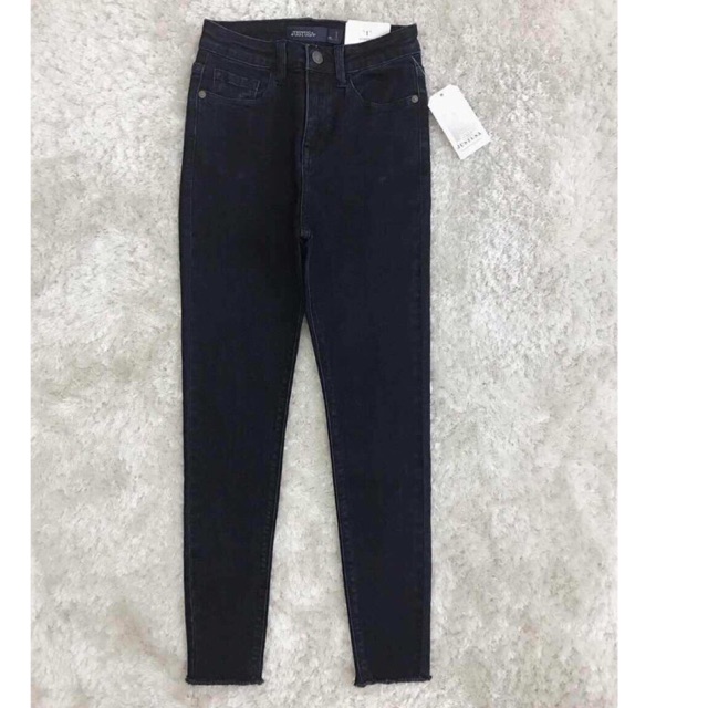 Jeans xuất tua lai