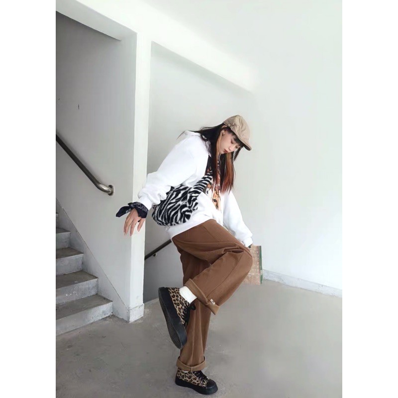 Giày thể thao độn đế da báo đế đen