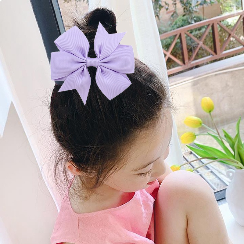 Kẹp tóc nơ bướm thời trang đáng yêu dành cho bé gái